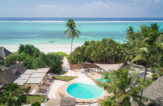 Discover affordable luxury beach resorts along Zanzibar's white-sand coastline.